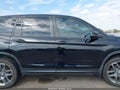 2022 Honda Passport — photo 13 of 16 | VIN 5FNYF8H55NB032600