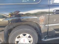 2004 GMC Yukon XL — photo 6 of 11 | VIN 1GKFK66U64J264023