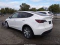 2024 Tesla Model Y — photo 3 of 17 | VIN 7SAYGDEE2RA250607