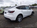 2024 Tesla Model Y — photo 4 of 17 | VIN 7SAYGDEE2RA250607