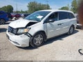2014 Honda Odyssey — photo 2 of 16 | VIN 5FNRL5H2XEB068901