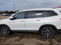 2022 Honda Pilot — photo 15 of 17 | VIN 5FNYF6H95NB016873