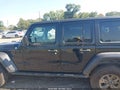 2021 Jeep Wrangler Unlimited — photo 14 of 17 | VIN 1C4HJXDN6MW546450