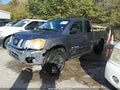 2015 Nissan Titan — photo 2 of 16 | VIN 1N6BA0CA3FN511429