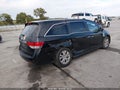 2014 Honda Odyssey — photo 4 of 17 | VIN 5FNRL5H64EB105914