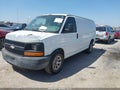 2009 Chevrolet Express 2500 — photo 2 of 12 | VIN 1GCFG15XX91129453