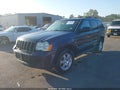 2009 Jeep Grand Cherokee — photo 2 of 11 | VIN 1J8GR48K19C504272