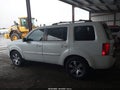 2012 Honda Pilot — photo 14 of 16 | VIN 5FNYF3H91CB033164