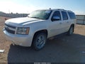 2010 Chevrolet Suburban 1500 — photo 2 of 16 | VIN 1GNUKKE3XAR160109