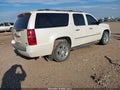 2010 Chevrolet Suburban 1500 — photo 4 of 16 | VIN 1GNUKKE3XAR160109