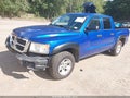 2008 Dodge Dakota — photo 2 of 10 | VIN 1D7HW38K98S556239