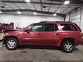 2003 GMC Envoy — photo 14 of 16 | VIN 1GKET16S636101979