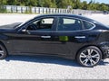 2015 Infiniti Q70 — photo 13 of 15 | VIN JN1BY1AP7FM542428
