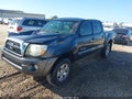 2011 Toyota Tacoma — photo 2 of 17 | VIN 3TMJU4GN7BM115387