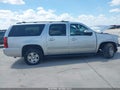 2012 Chevrolet Suburban 1500 — photo 14 of 18 | VIN 1GNSCJE02CR123000