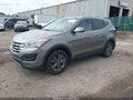 2014 Hyundai Santa Fe — photo 2 of 11 | VIN 5XYZT3LB3EG193257