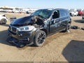 2015 BMW X5 — photo 2 of 15 | VIN 5UXKR2C58F0H39533
