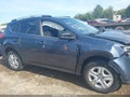 2014 Toyota RAV4 — photo 13 of 16 | VIN JTMZFREV5ED037902