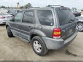 2003 Ford Escape — photo 3 of 11 | VIN 1FMYU03173KB89259