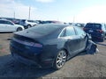 2016 Lincoln MKZ — photo 4 of 17 | VIN 3LN6L2G90GR623755