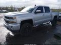 2018 Chevrolet Silverado 1500 — photo 2 of 16 | VIN 3GCUKREC3JG347239
