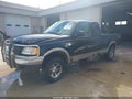2000 Ford F-150 — photo 2 of 12 | VIN 2FTRX18LXYCA72108