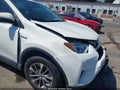2018 Toyota RAV4 Hybrid — photo 17 of 19 | VIN JTMRJREVXJD231897