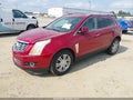 2014 Cadillac SRX — photo 2 of 20 | VIN 3GYFNEE31ES656665