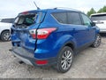 2018 Ford Escape — photo 4 of 17 | VIN 1FMCU9J90JUA75676