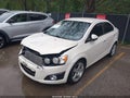 2014 Chevrolet Sonic — photo 2 of 16 | VIN 1G1JE5SB2E4212067