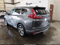 2018 Honda CR-V — photo 3 of 16 | VIN 2HKRW2H55JH613107