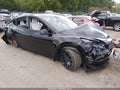 2024 Tesla Model Y — photo 1 of 18 | VIN 7SAYGDEF3RA311570