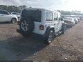 2021 Jeep Wrangler Unlimited — photo 4 of 16 | VIN 1C4HJXDN0MW671010