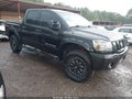 2011 Nissan Titan — photo 1 of 17 | VIN 1N6AA0EC5BN309115