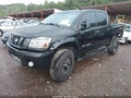 2011 Nissan Titan — photo 2 of 17 | VIN 1N6AA0EC5BN309115