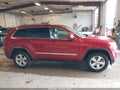 2011 Jeep Grand Cherokee — photo 13 of 16 | VIN 1J4RR4GG4BC550059
