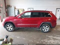 2011 Jeep Grand Cherokee — photo 14 of 16 | VIN 1J4RR4GG4BC550059