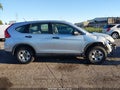 2015 Honda CR-V — photo 13 of 16 | VIN 5J6RM4H3XFL048009
