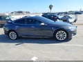 2016 Tesla Model S — photo 13 of 18 | VIN 5YJSA1E17GF176987