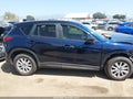 2013 Mazda CX-5 — photo 13 of 16 | VIN JM3KE2CE1D0118343