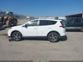 2016 Toyota RAV4 — photo 12 of 14 | VIN JTMWFREV0GJ081944