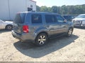 2012 Honda Pilot — photo 4 of 17 | VIN 5FNYF4H95CB060308