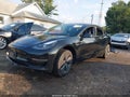 2023 Tesla Model 3 — photo 2 of 18 | VIN 5YJ3E1EB8PF631945