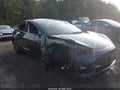 2023 Tesla Model 3 — photo 6 of 18 | VIN 5YJ3E1EB8PF631945