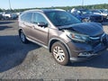 2015 Honda CR-V — photo 1 of 16 | VIN 2HKRM3H7XFH550588