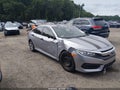 2018 Honda Civic — photo 13 of 16 | VIN 2HGFC2F51JH607796