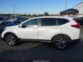 2018 Honda CR-V — photo 14 of 16 | VIN 5J6RW2H53JL015586