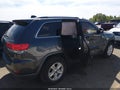 2015 Jeep Grand Cherokee — photo 14 of 17 | VIN 1C4RJEAG3FC218292