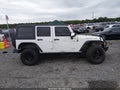 2012 Jeep Wrangler Unlimited — photo 13 of 16 | VIN 1C4BJWFG3CL278018