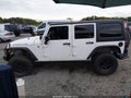 2012 Jeep Wrangler Unlimited — photo 14 of 16 | VIN 1C4BJWFG3CL278018
